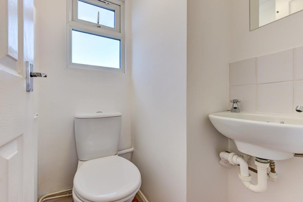 Compact and clean WC with modern white fittings...