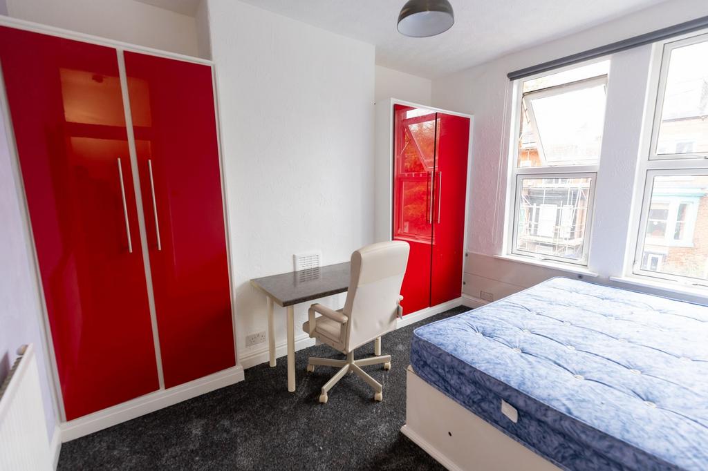 Bright and clean single bedroom featuring vibra...