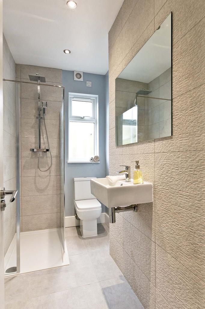 Contemporary tiled bathroom with a walk-in show...