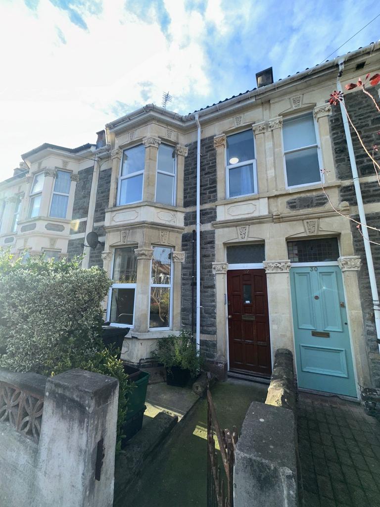 Attractive traditional terraced house façade wi...