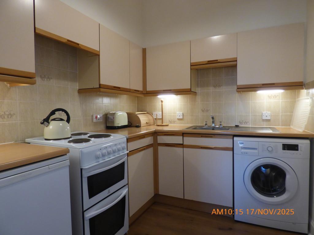 Internal kitchen off sitting room.