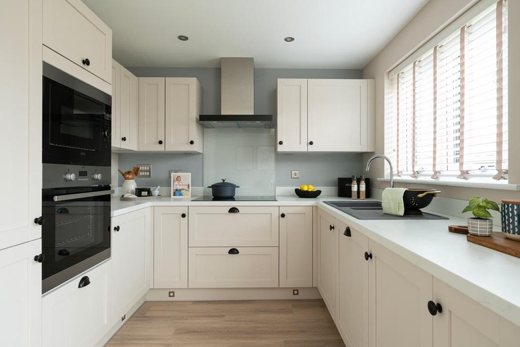 A modern kitchen with ample storage space