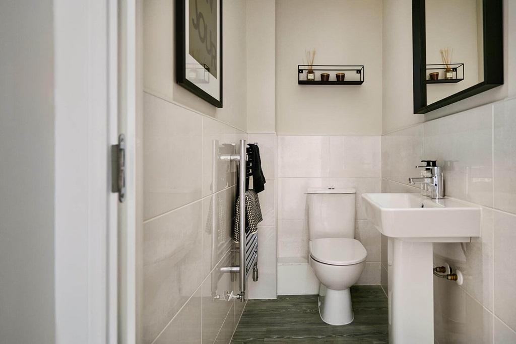 A guest cloakroom completes the ground floor