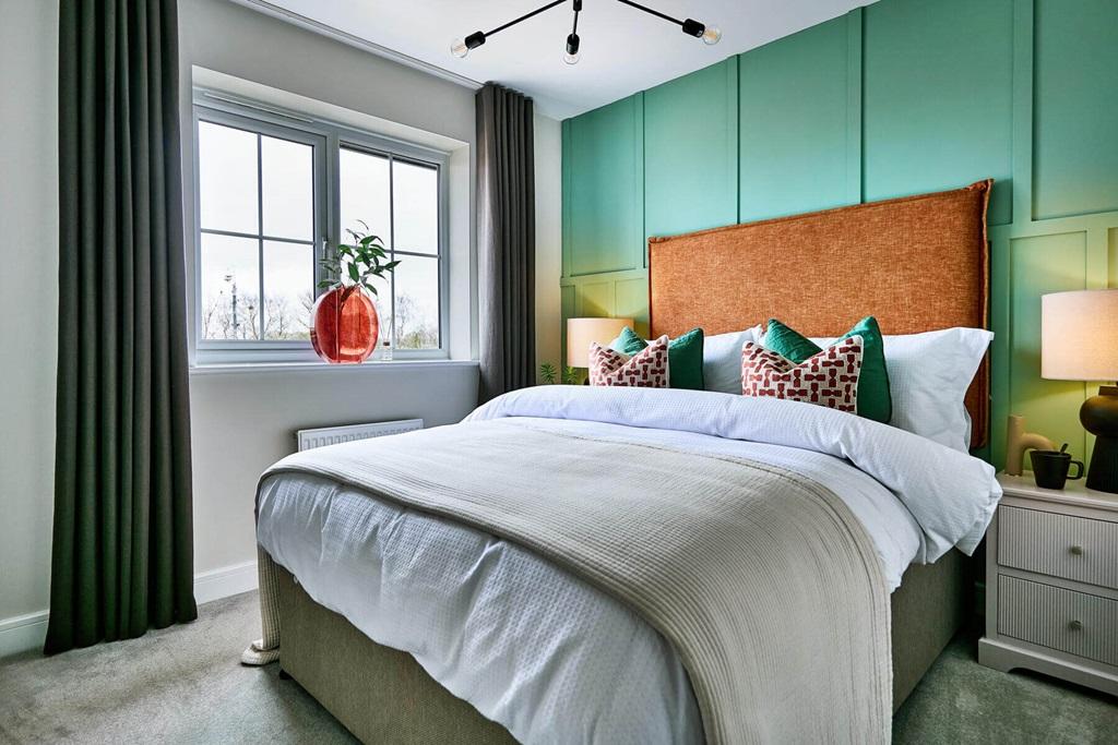 The main bedroom creates a place of quiet away...