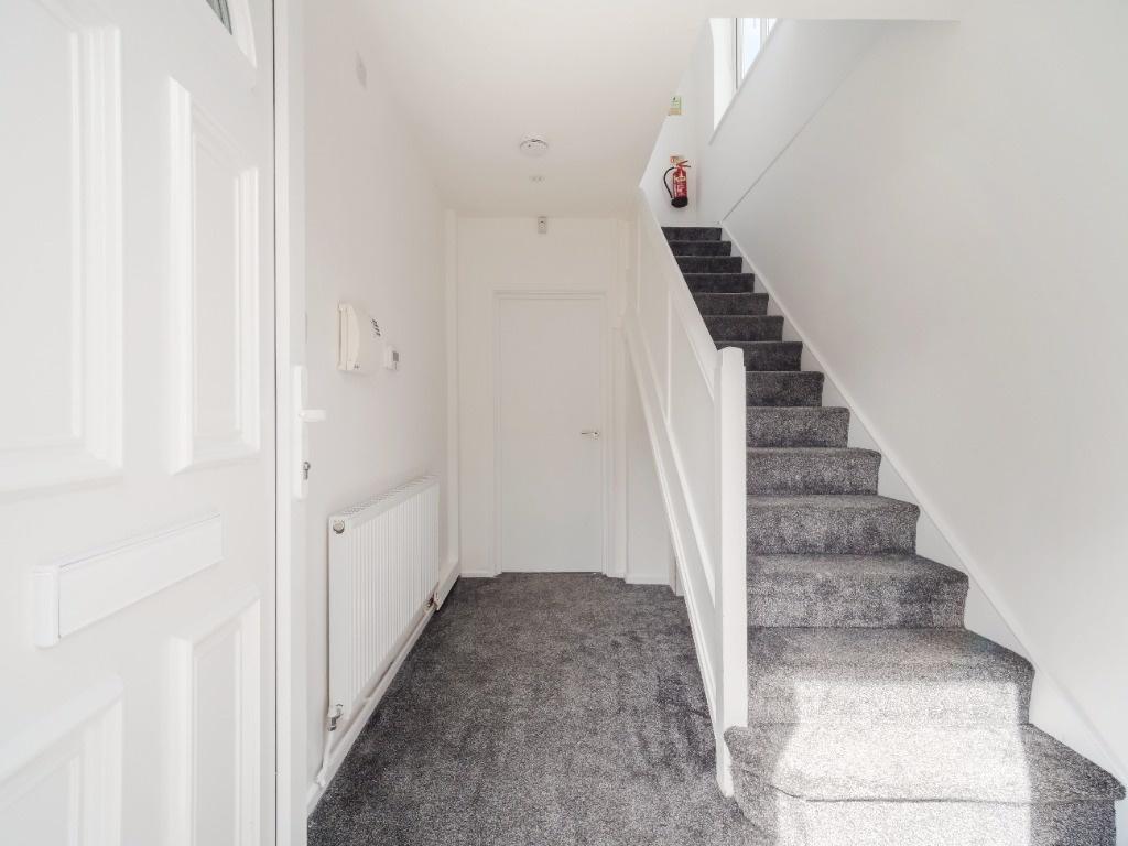 Bright, freshly redecorated entrance hallway wi...