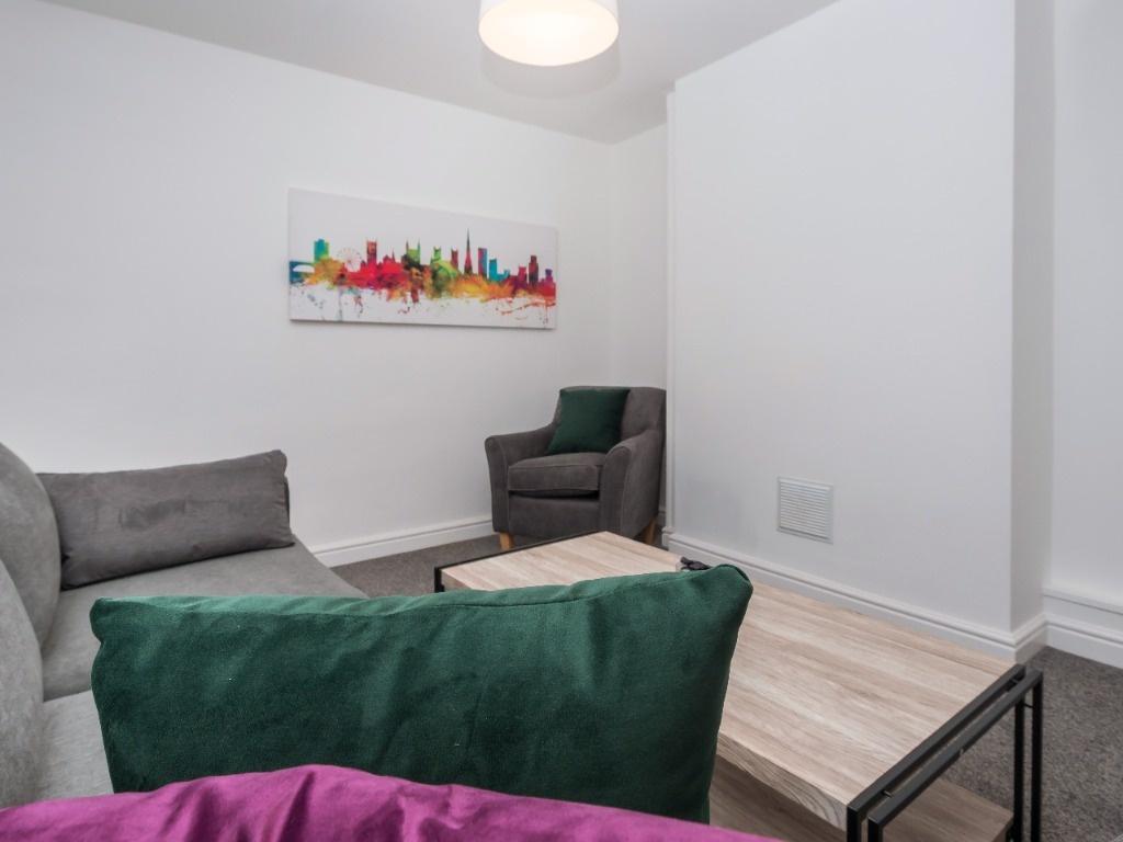 Bright, modern lounge with comfortable seating,...