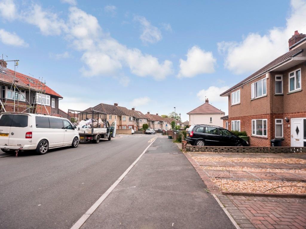 Quiet residential street with semi‑detached hou...