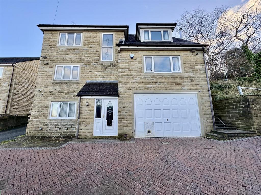 External front, integral garage and driveway