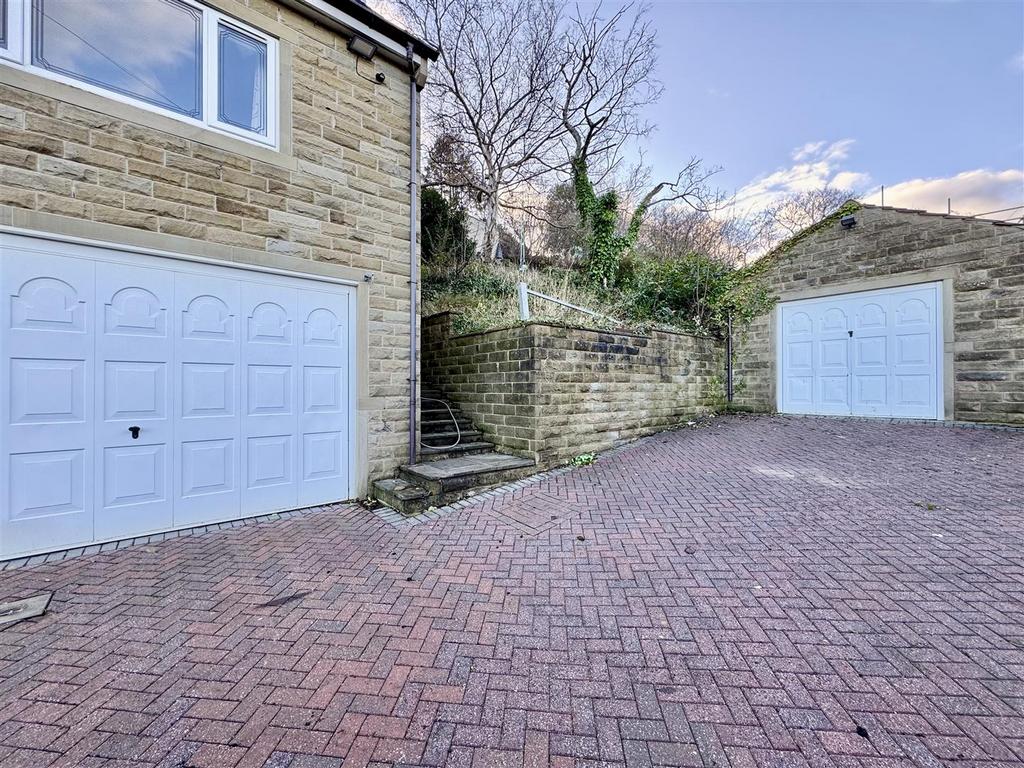 External front, integral garage and driveway