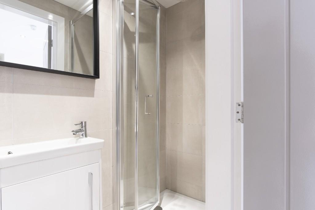 A modern and well-maintained bathroom featuring...