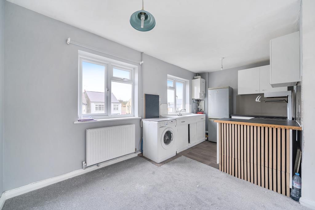 Reception/Kitchen/Dining Area