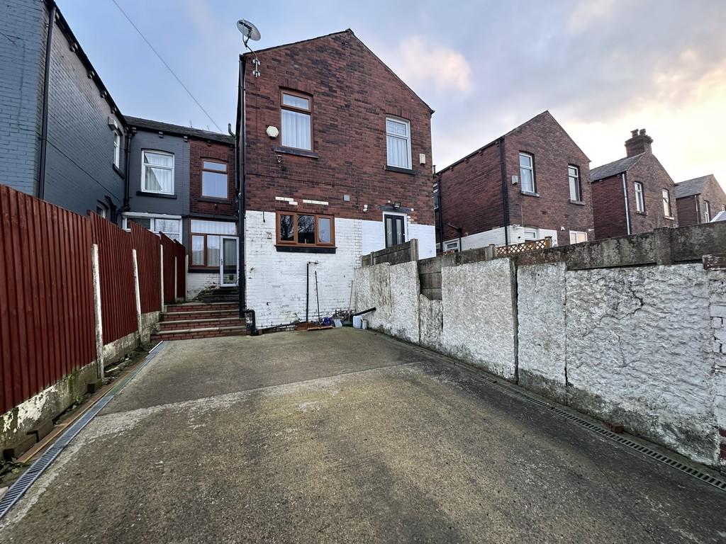 Rear yard/driveway