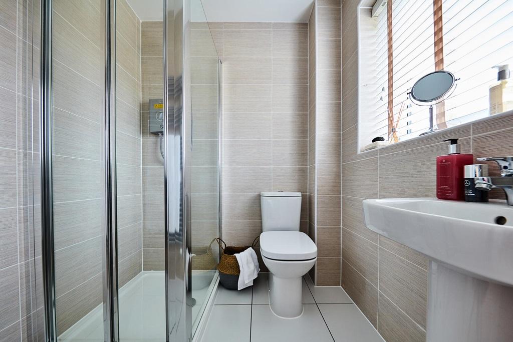 An en suite shower room away from the family