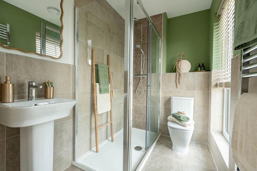 Two bedrooms boast their own en-suite shower rooms