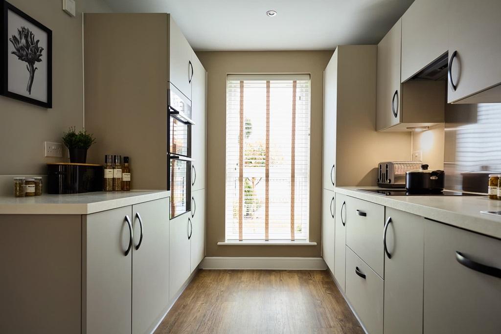 Galley kitchen filled with light