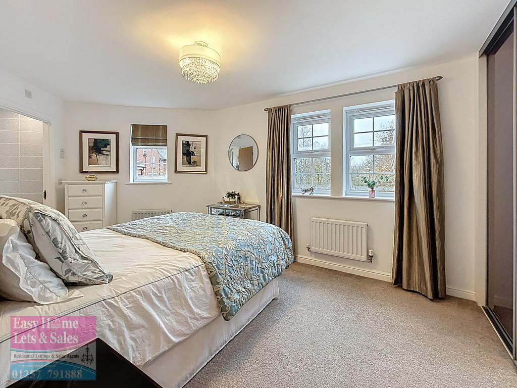 Master Bedroom With Built In Wardrobes w