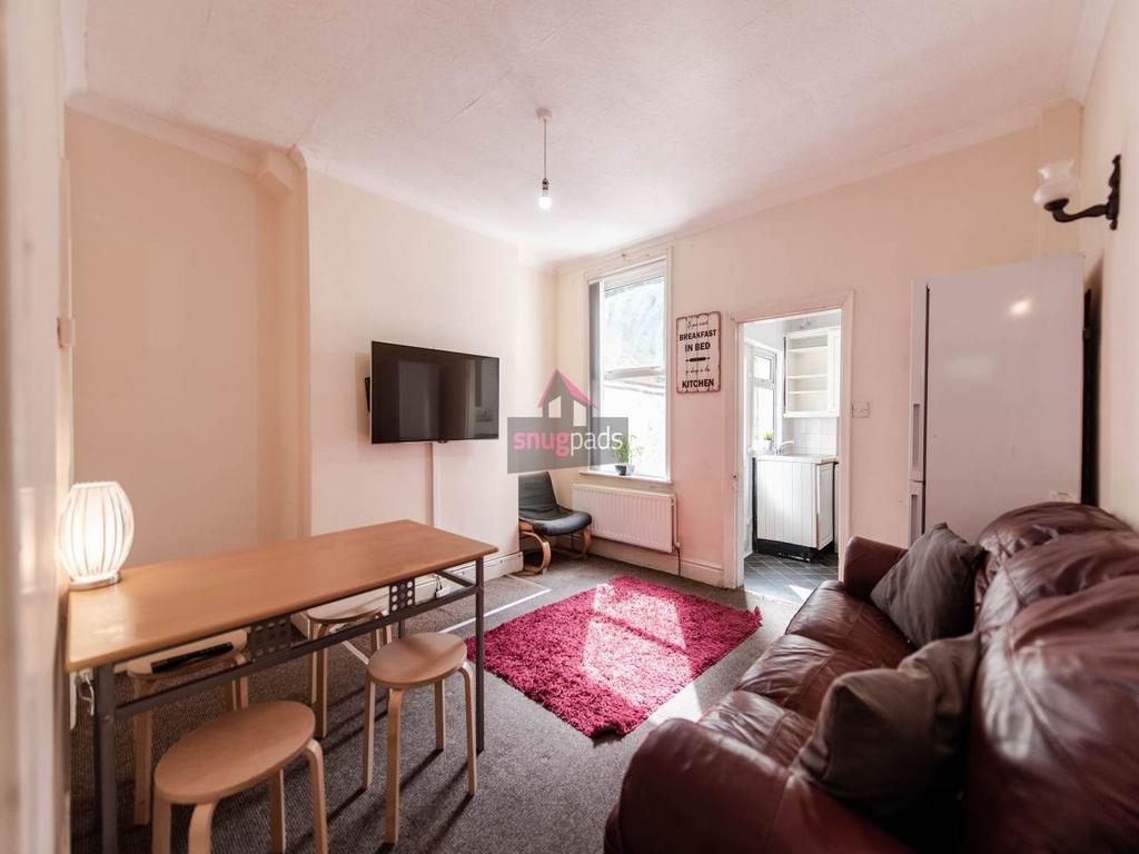 Bright and welcoming living room with a comfort...