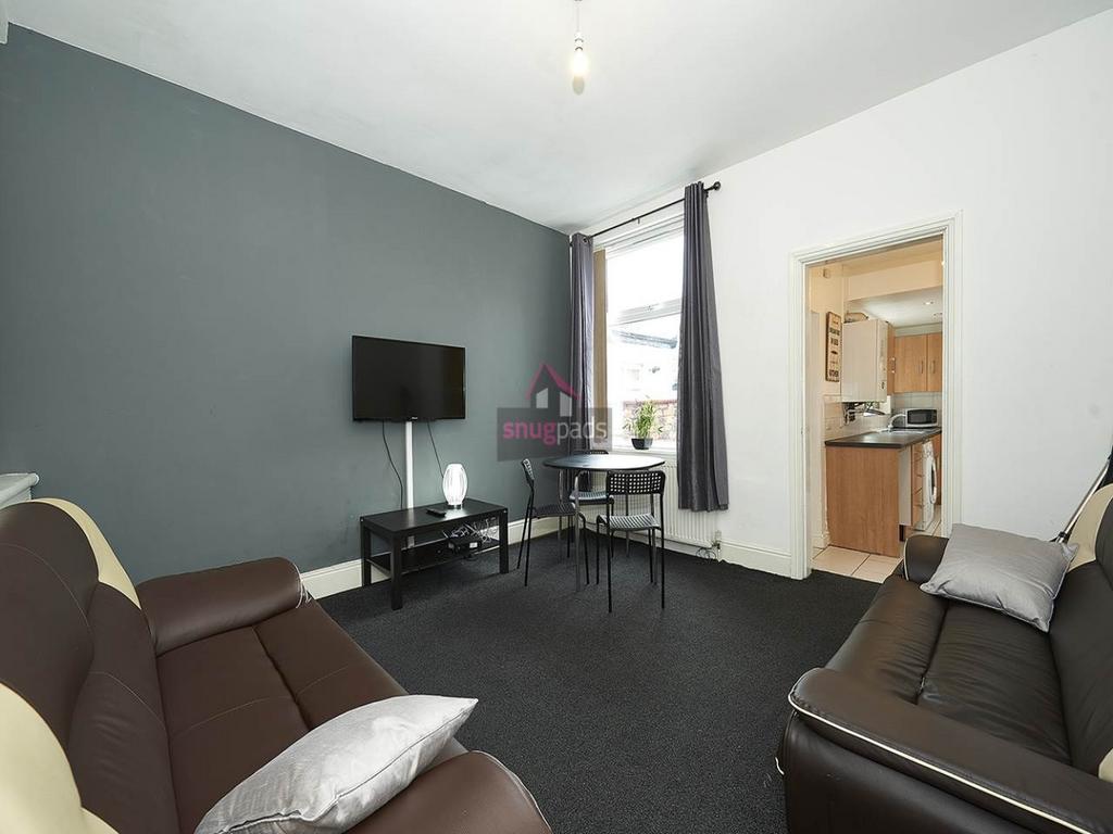 Bright, modern living room with neutral décor, ...