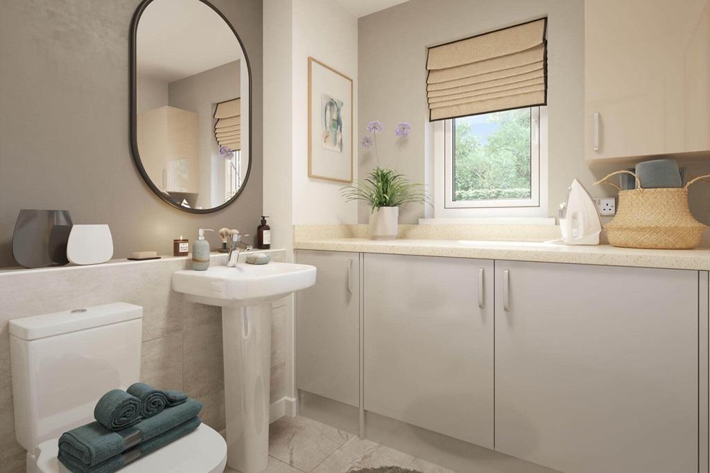The guest cloakroom hosts space for laundry...