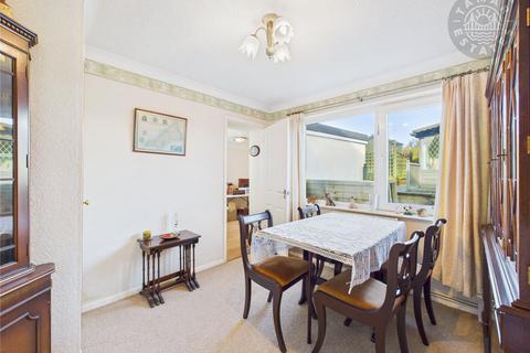 undefined, “A charming two-bedroom link-detached bungalow with easy living.”