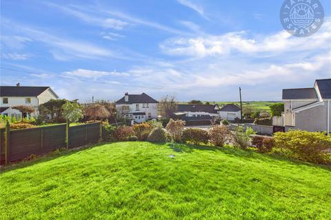 undefined, “A charming two-bedroom link-detached bungalow with easy living.”
