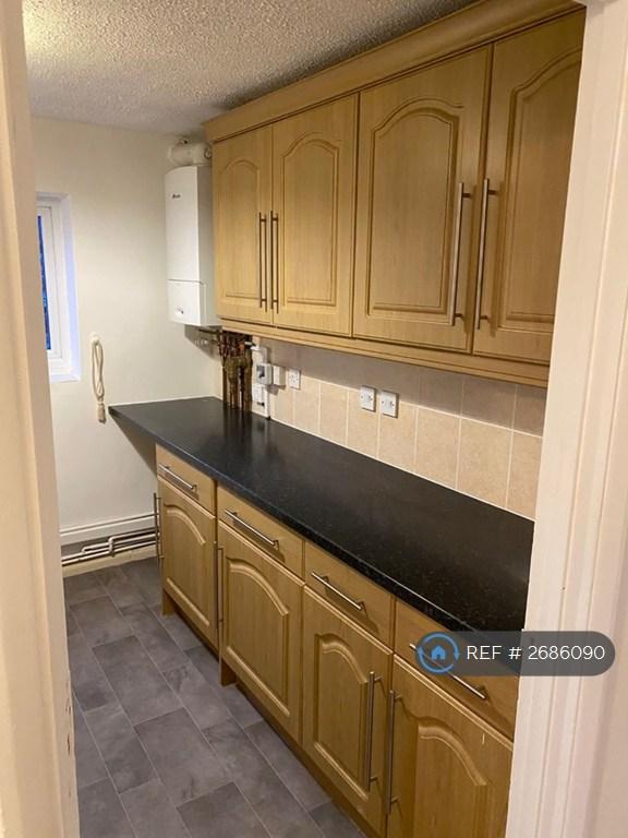 Kitchen Fridge-Freezer And Cabinets