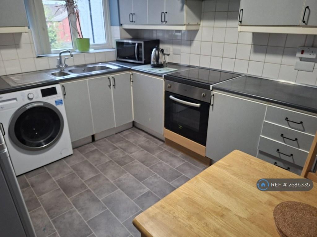 Fully Equipped Kitchen With Dining