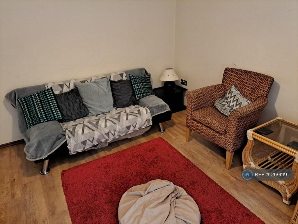 Now a Different Sofa, Purple Rug.