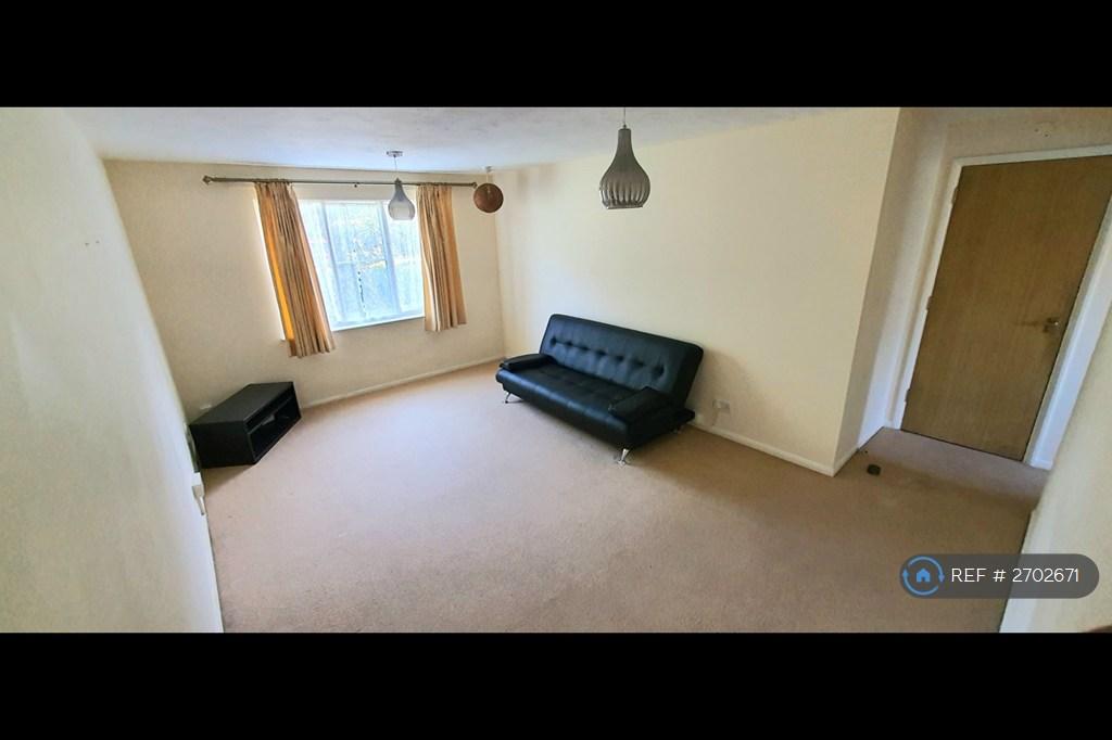 Living Room With Leather Sofa Bed And 2x Tables
