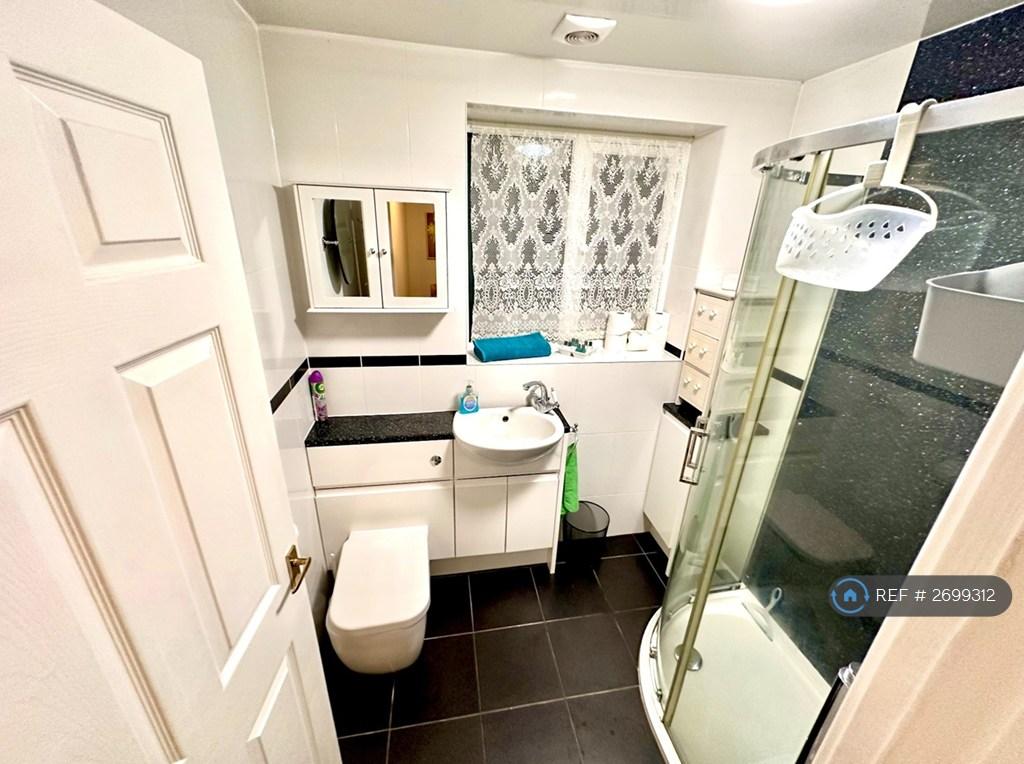Shower, w/b & Toilet