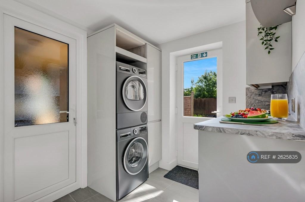 Utility Room Featuring Bosch Laundry Machines