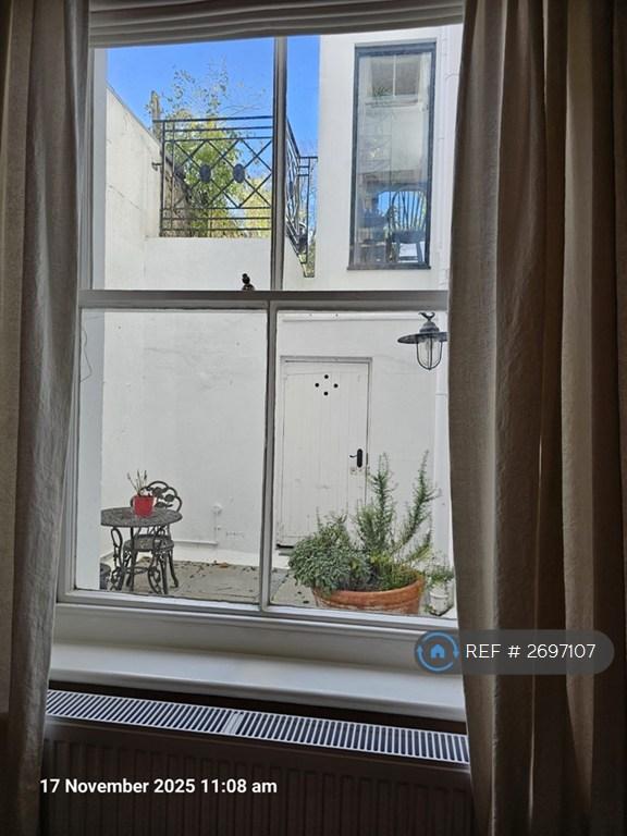 View To Private Rear Courtyard From Bedroom