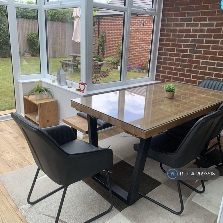 Modern Dinning Area Overlooking Garden