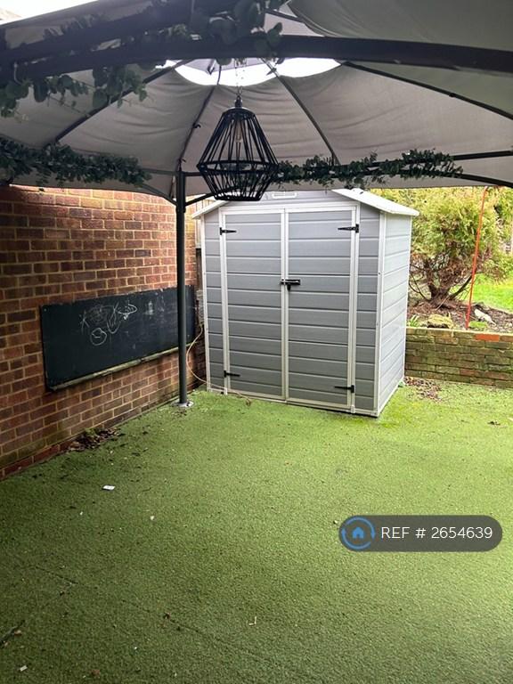 Play Area With Chalkboard And Garden Shed