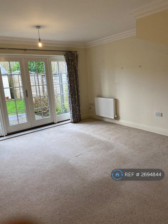 Large Lounge Opening To Peaceful Garden.
