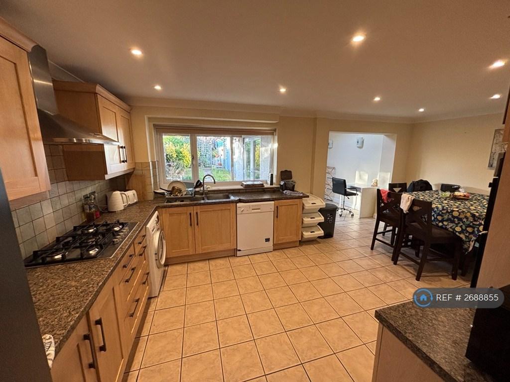 Spacious Kitchen Diner With All White Goods