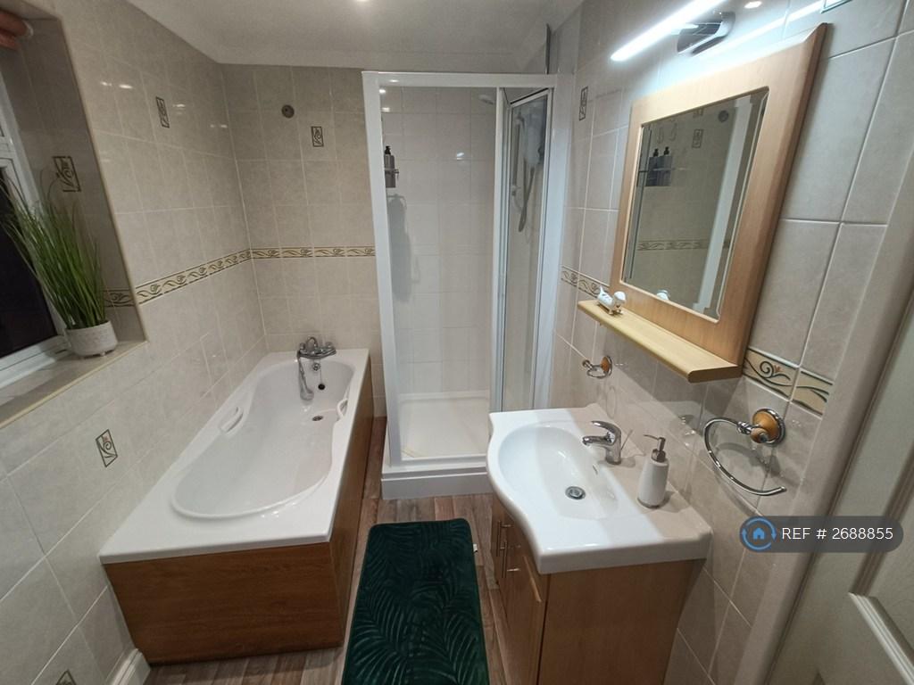 Bathroom With Bath, Shower, Sink And Toilet