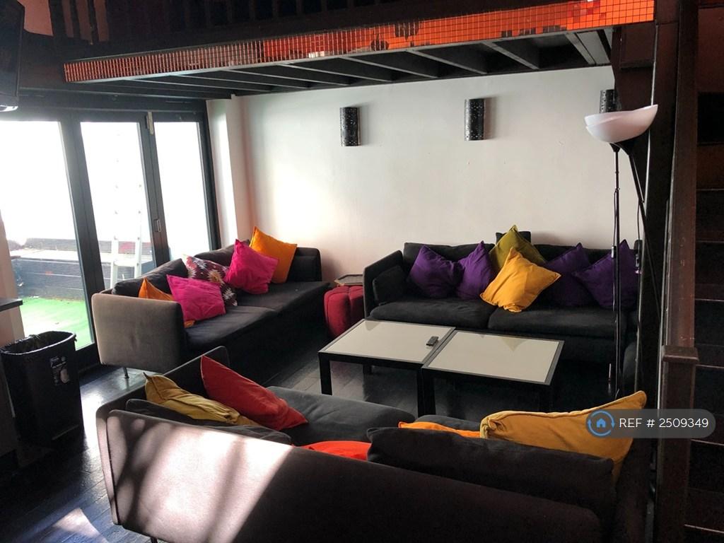 Lounge Area With Patio Access