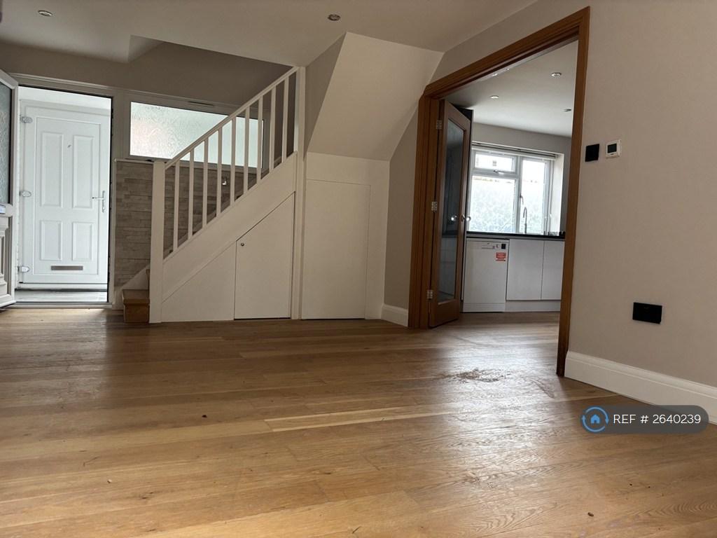 Living Room With Double Glass Door To The Kitchen