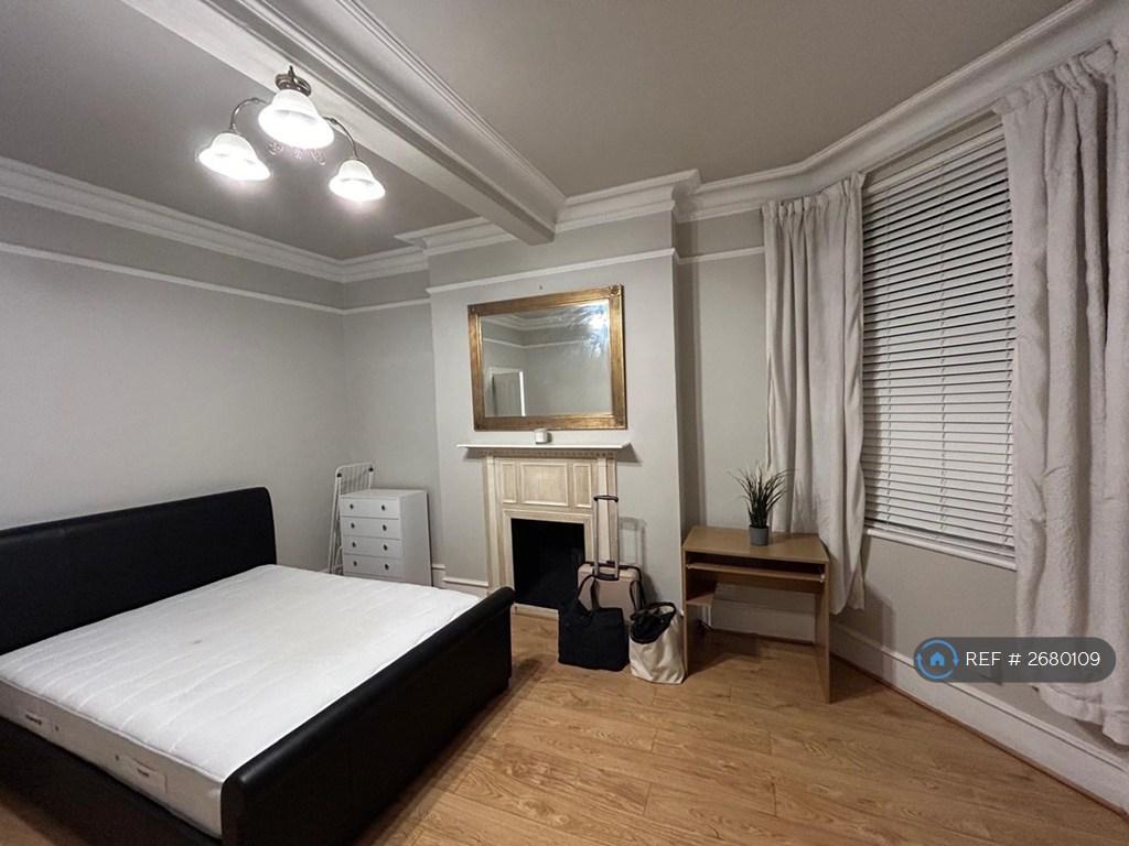 Living Room/Currently Used As a Second Bedroom
