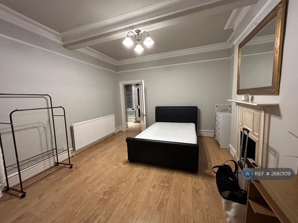 Living Room/Currently Used As a Second Bedroom