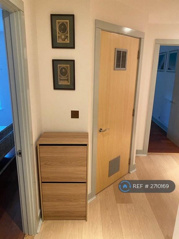Front Hallway With Shoe Cabinet