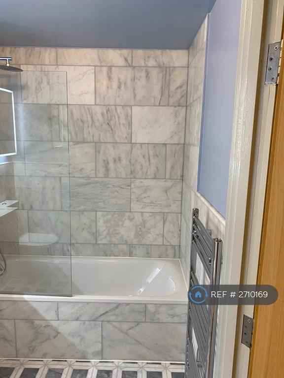 Marble Tiled Bathroom