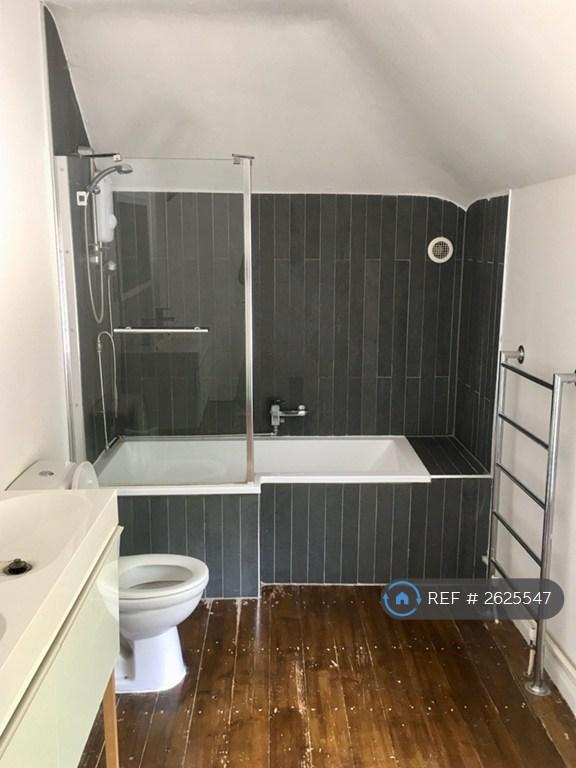 Bathroom With Corner Bath.