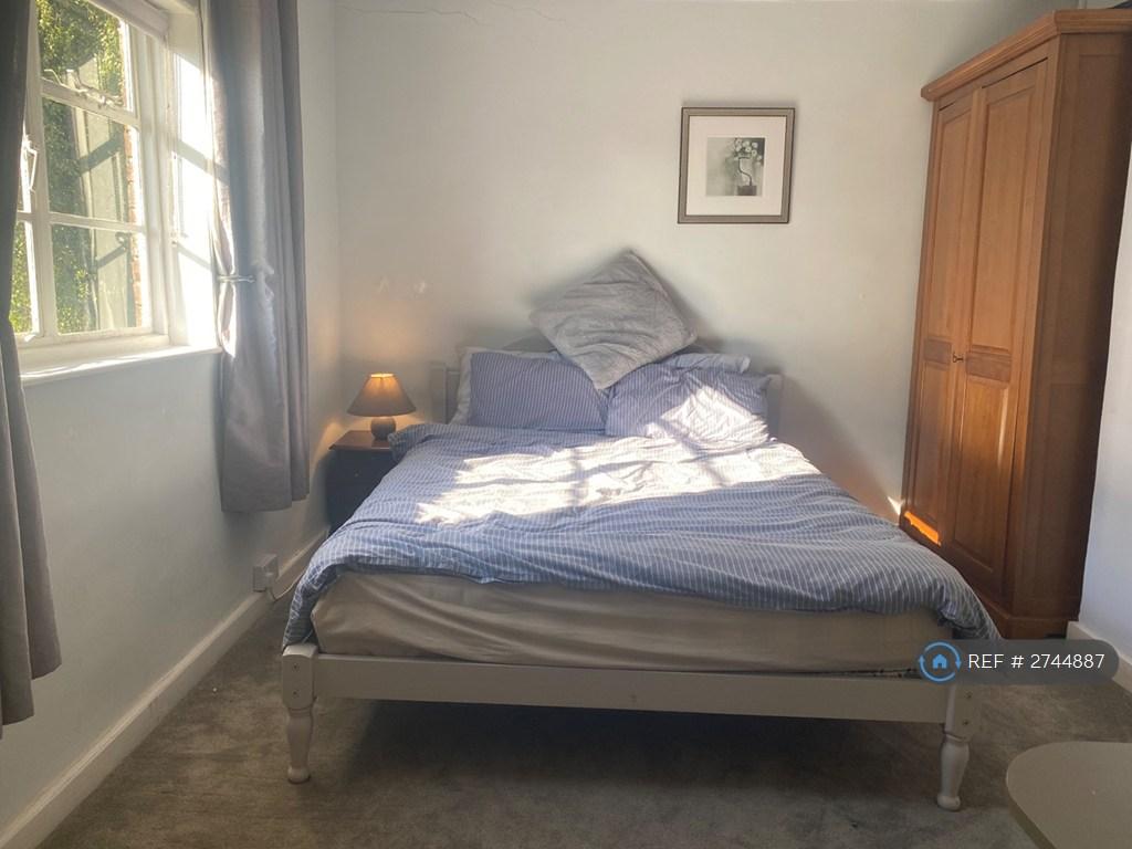 Double Bed. View Of Woodland And Pond.