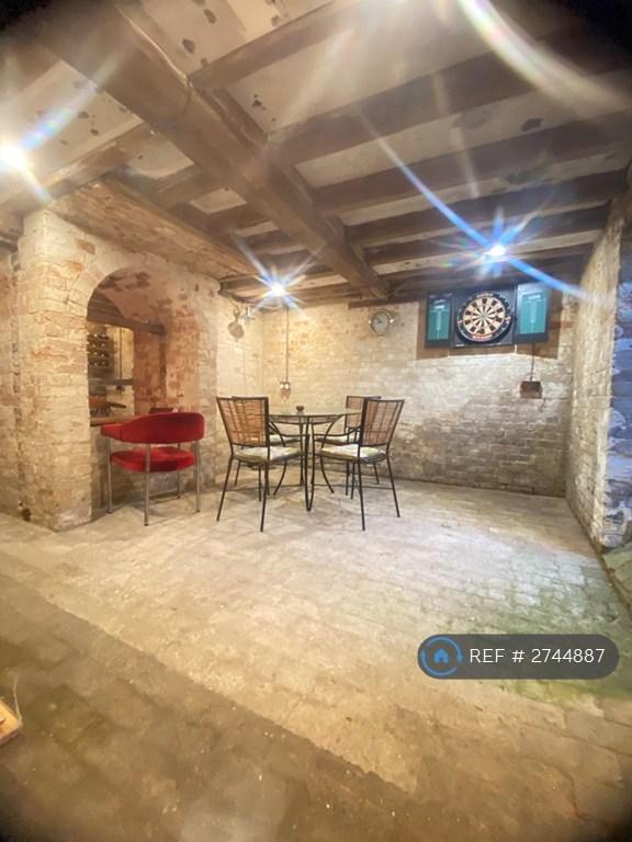 Huge Basement Bar With Darts.