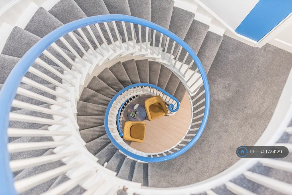 Tivoli Guesthouse Elegant Spiral Staircase
