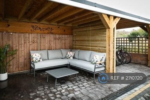 Outdoor Living Space And Secure Bicycle Shelter