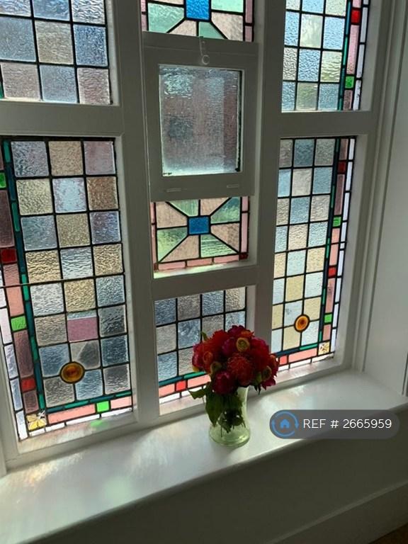 Large Victorian Building With Stained Glass