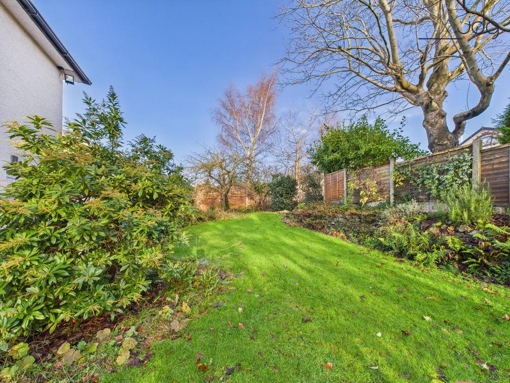 Spacious Garden with a mixture of lawn, mature...